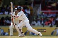BANGALORE, INDIA - OCTOBER 11:  Sourav Ganguly of India square cuts during day three of the First Test between India and Australia a tthe M.Chinnaswamy Stadium on October 11, 2008 in Bangalore, India.  (Photo by Michael Steele/Getty Images)